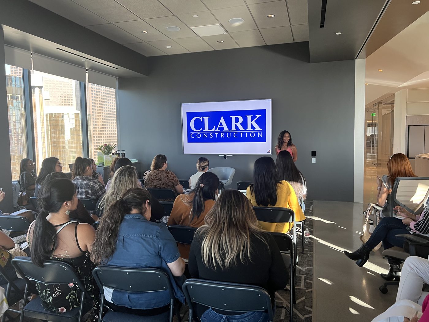 Krystal Estavan leading a wellness session at Clark Construction